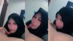 Gadis Berjilbab Mengulum Batang Kekasihnya